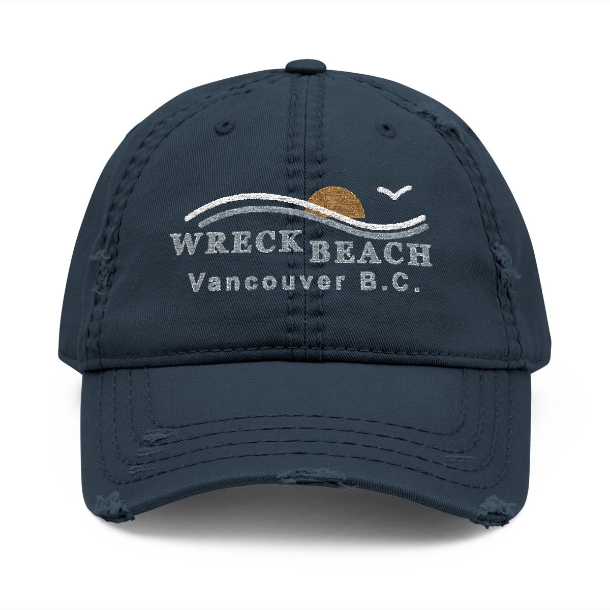 Distressed navy dad hat embroidered with a gold sun behind a white and sky-blue wave, a gull, and Wreck Beach, Vancouver B.C.
